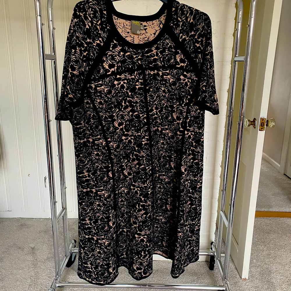 Intricate patterned dress.